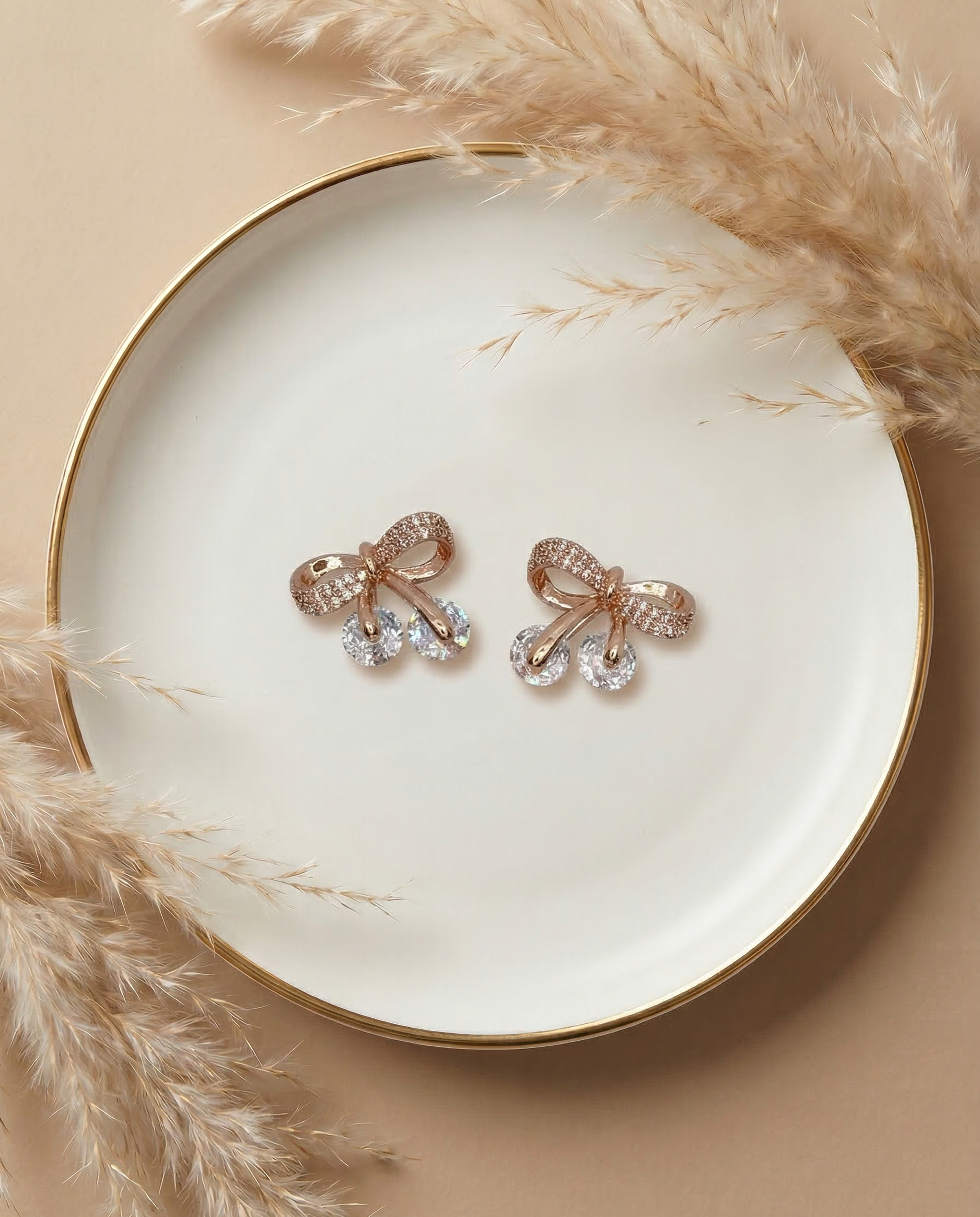Crystal Bow Stud Earrings with Twin Drop Accents