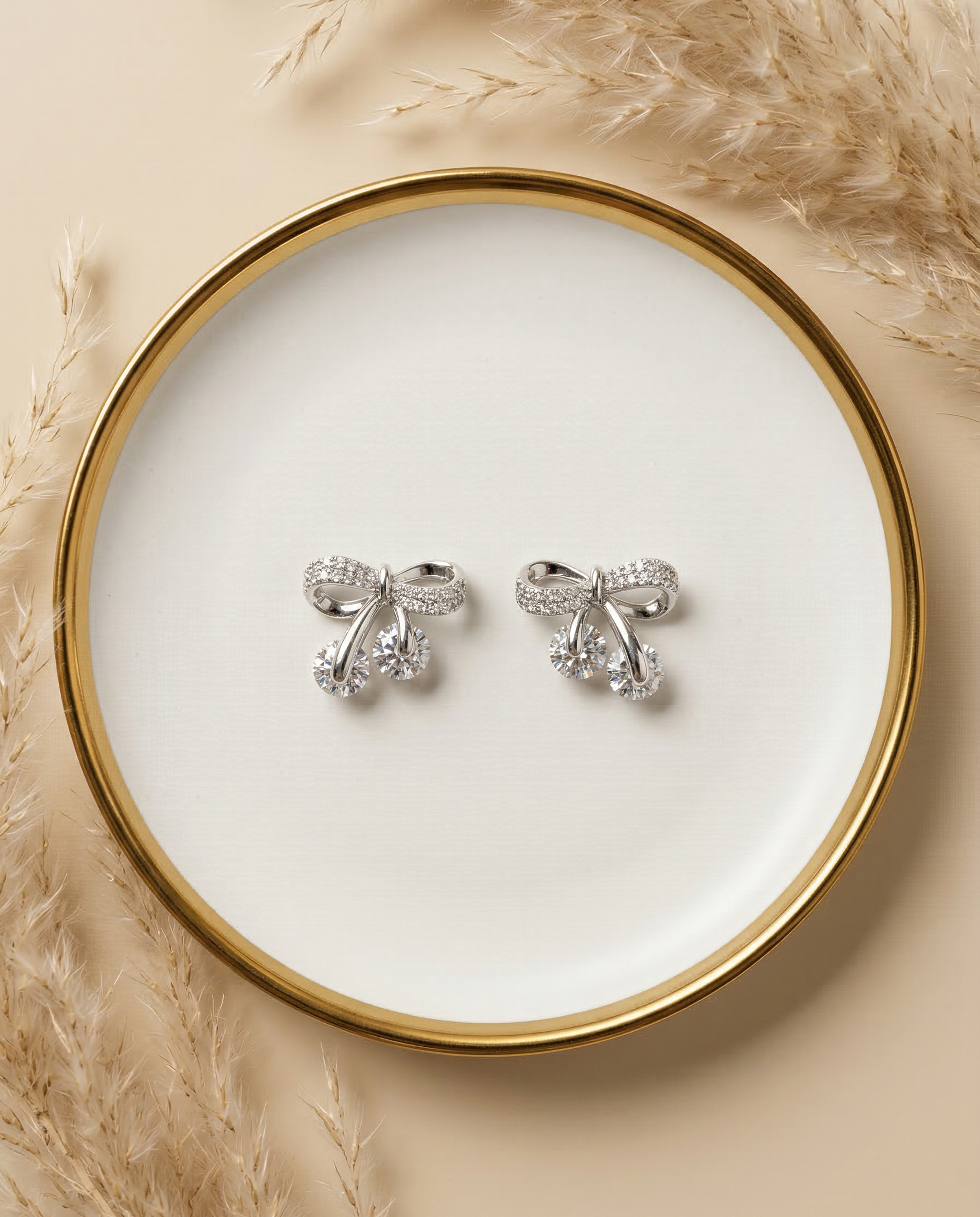 Crystal Bow Stud Earrings with Twin Drop Accents