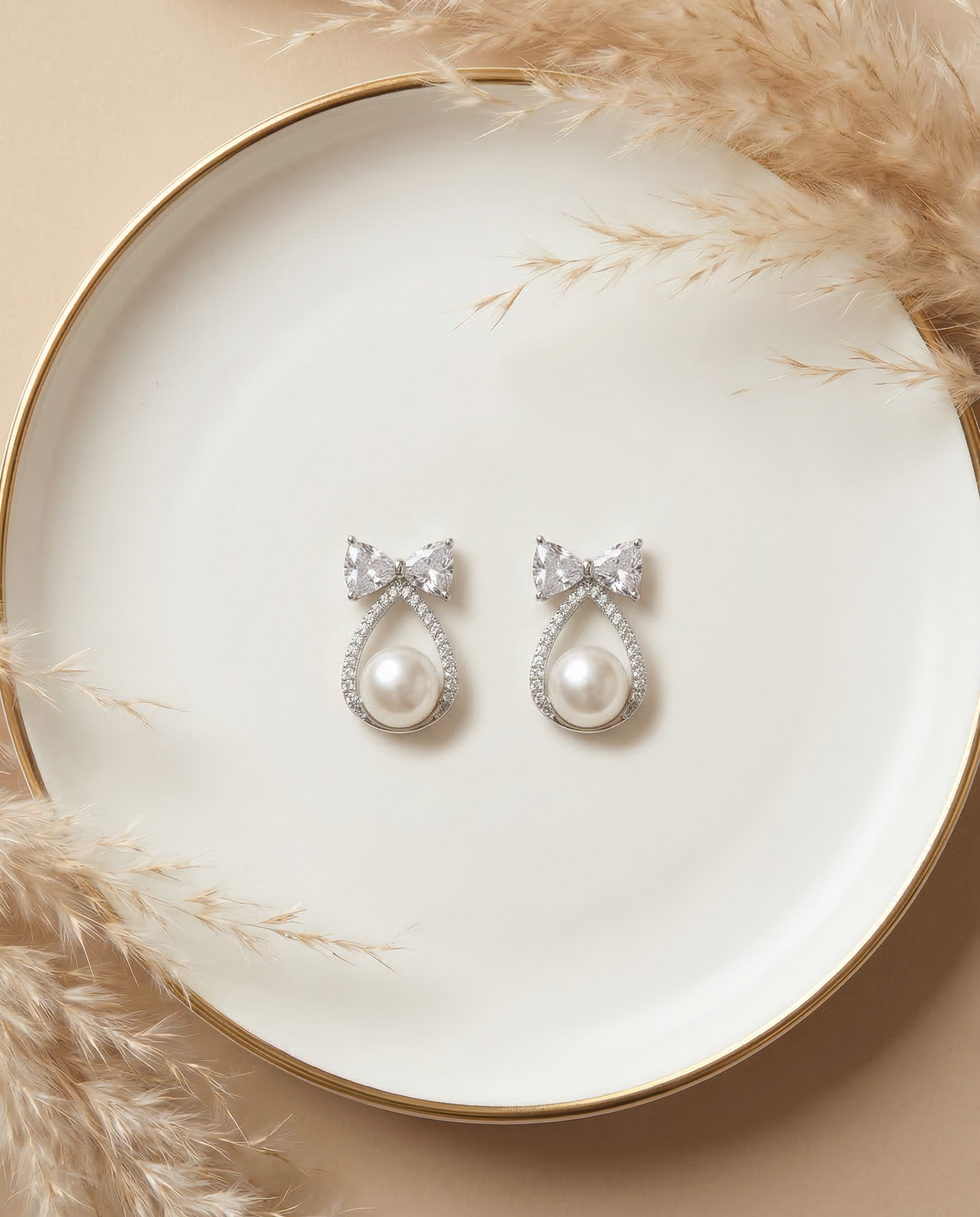 Pearl Bow Drop Earrings in Rose Gold Finish