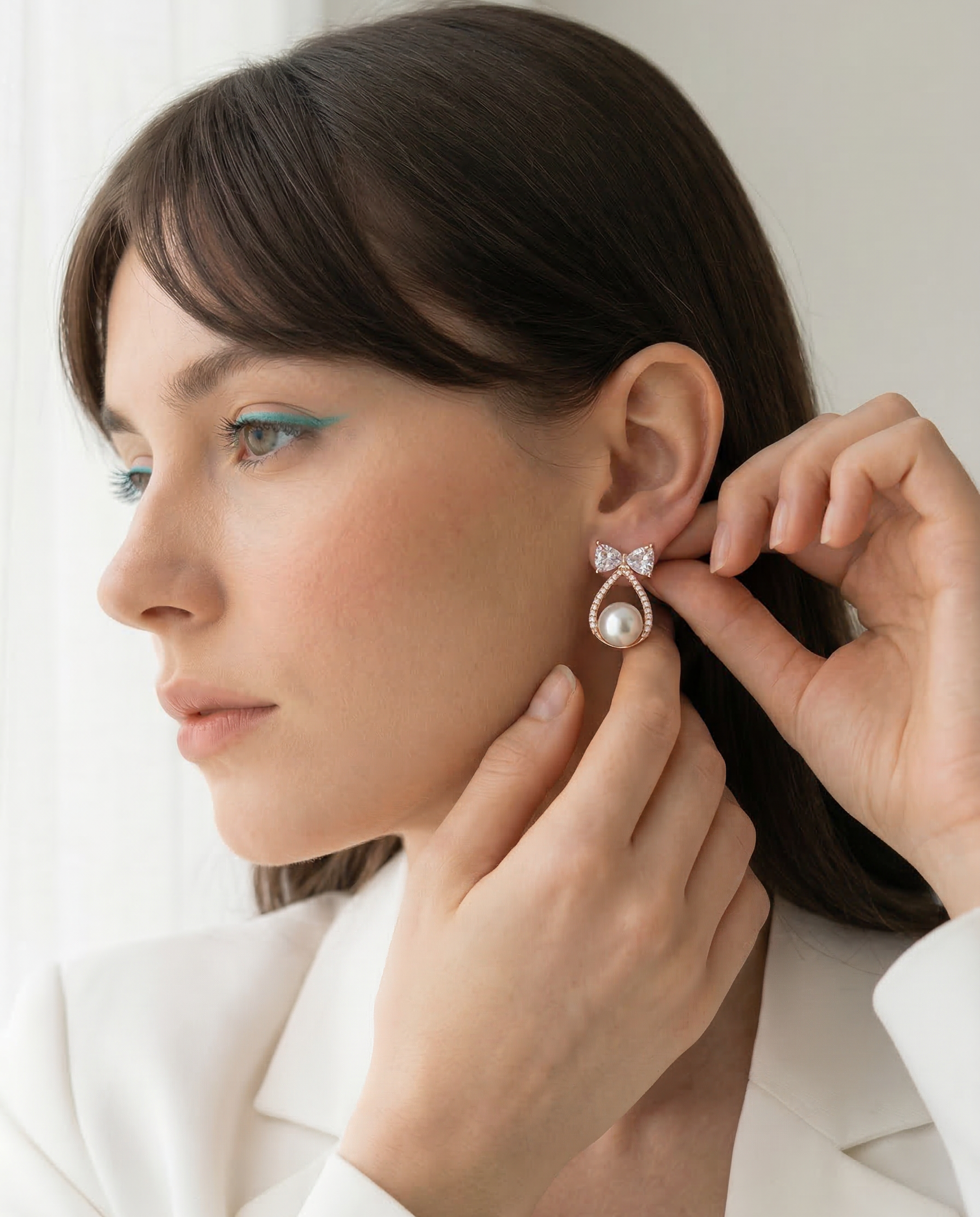 Pearl Bow Drop Earrings in Rose Gold Finish